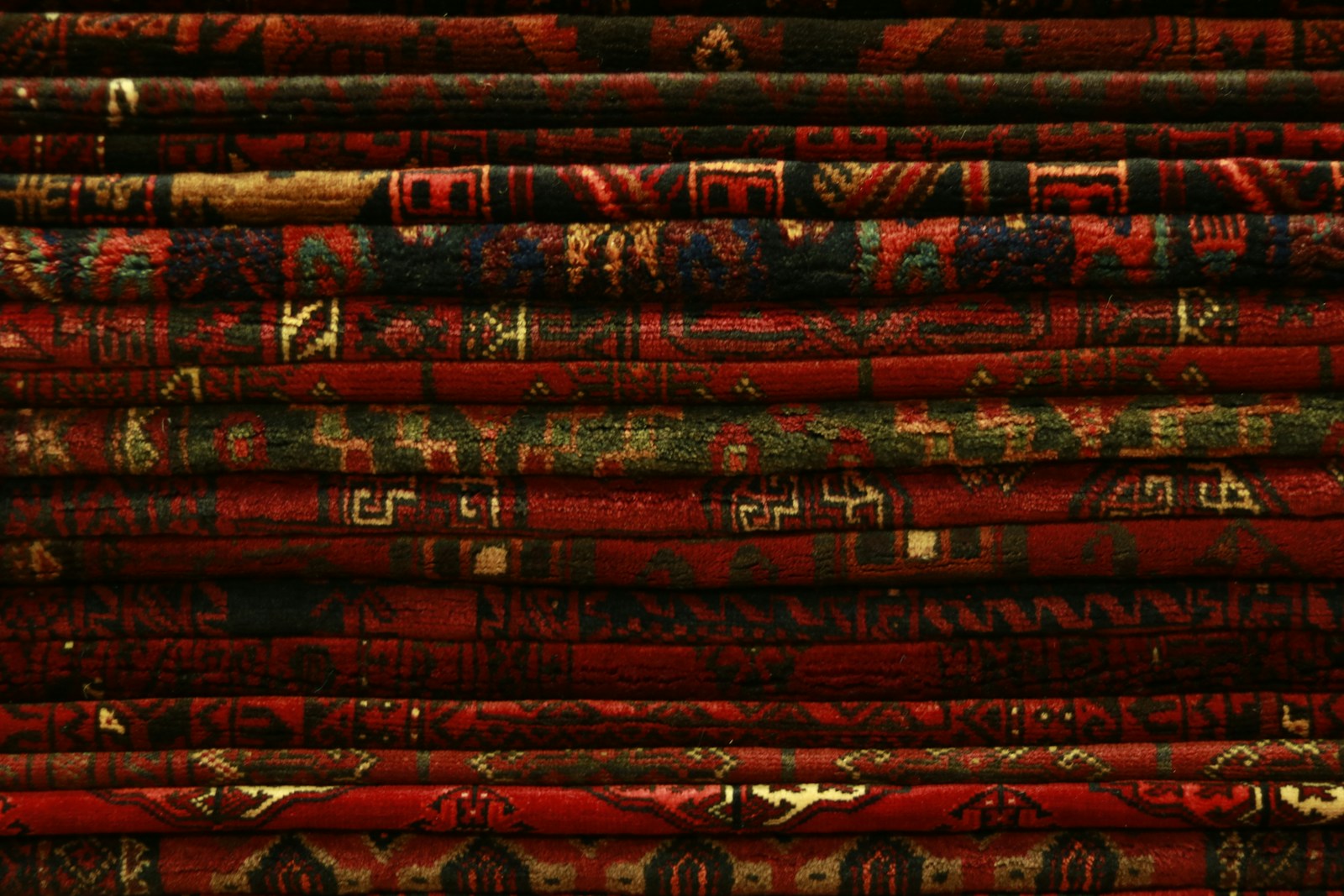 stack of red textiles